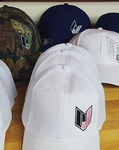 A row of embroidered caps